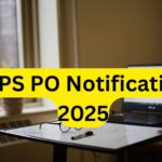 IBPS PO Notification 2025 written in bold black text on yellow banner with a laptop and study table in background.
